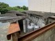 屋根工事を行う前の水戸市内の破損した波板スレート屋根